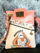 Load image into Gallery viewer, a peach crossbody bag with a reading ghost design
