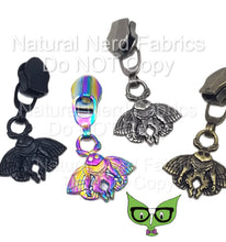 Load image into Gallery viewer, Four zipper pulls with a mothman charm. The charms are in black, antique silver, bronze, and iridescent rainbow colors. The zipper pulls are made of metal.