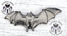 Load image into Gallery viewer, A silver-colored metal bat-shaped snap embellishment. The bat has outstretched wings and detailed features. This item is suitable for crafting and sewing projects.