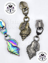 Load image into Gallery viewer, Three conch shell zipper pulls in three finishes: matte rainbow, antique bronze, and antique silver