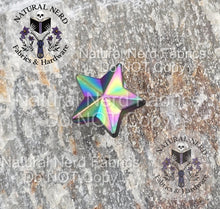 Load image into Gallery viewer, Matte Rainbow star-shaped Chicago screw on a textured surface with 'Natural Nerd' branding.