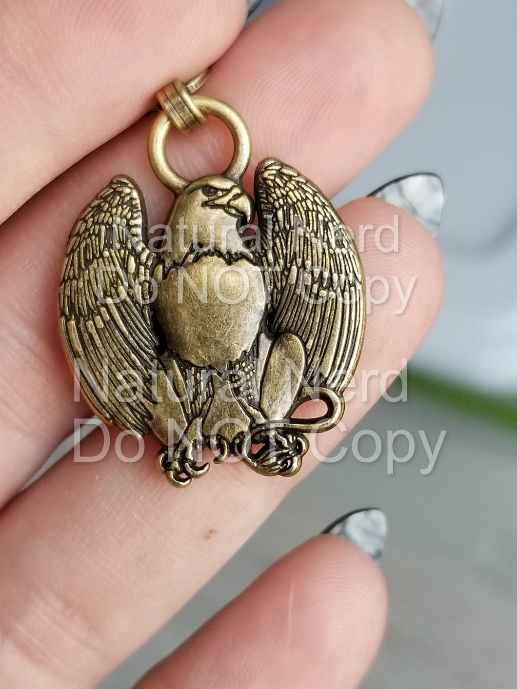 Griffin Zipper Pull
