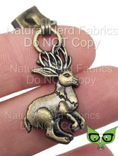 Load image into Gallery viewer, A close-up of a bronze zipper pull in the shape of a jackalope.
