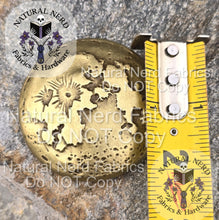 Load image into Gallery viewer, Bronze magnetic snap design to look like a full moon shown next to a ruler indicating this is a very large snap with a two inch diameter.
