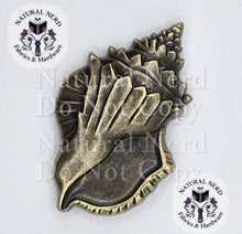 Load image into Gallery viewer, A bronze conch shell-shaped magnetic snap.
