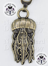 Load image into Gallery viewer, close up of a bronze colored jellyfish zipper pull
