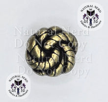 Load image into Gallery viewer, A single antique  bronze knot-shaped Chicago Screw, shown on a plain white background with two 'Natural Nerd Fabrics &amp; Hardware' logos and a faint watermark overlay.
